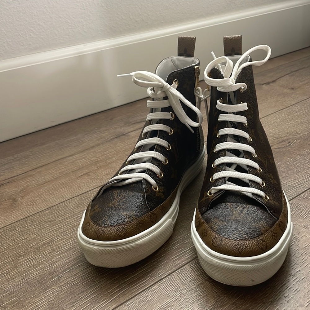 LOUIS VUITTON
Patent Reverse Monogram Stellar Sneaker Boots